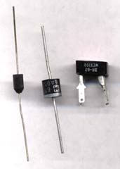 Silicon diodes. 4-terminal bridge rectifier at right.